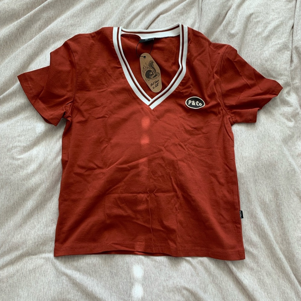 P&Co orange top